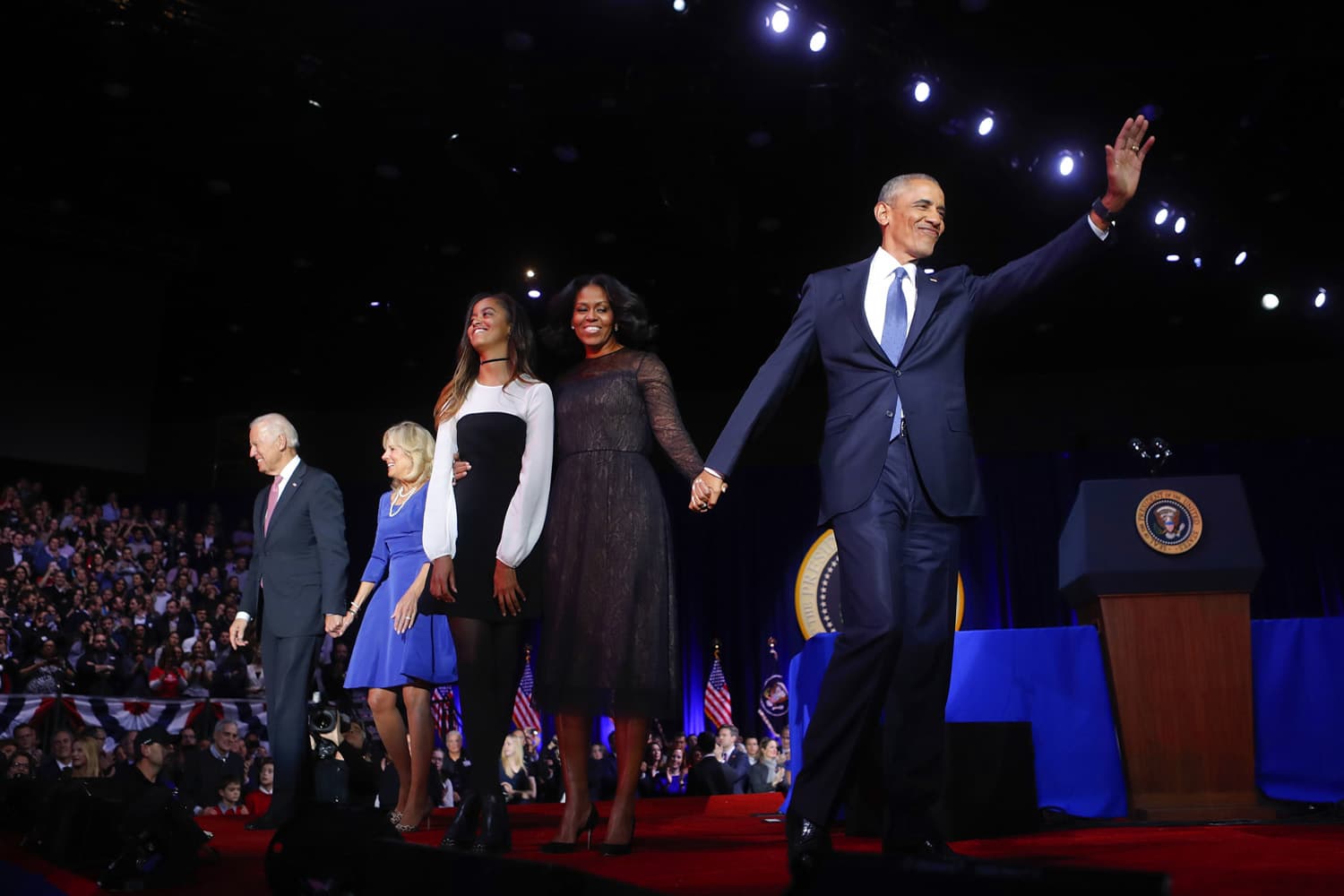 President Barack Obama waves on stage with first lady Michelle Obama, daughter Malia, Vice President Joe Biden and his wife Jill Biden after his farewell address at McCormick Place in Chicago. (Pablo Martinez Monsivais/AP)