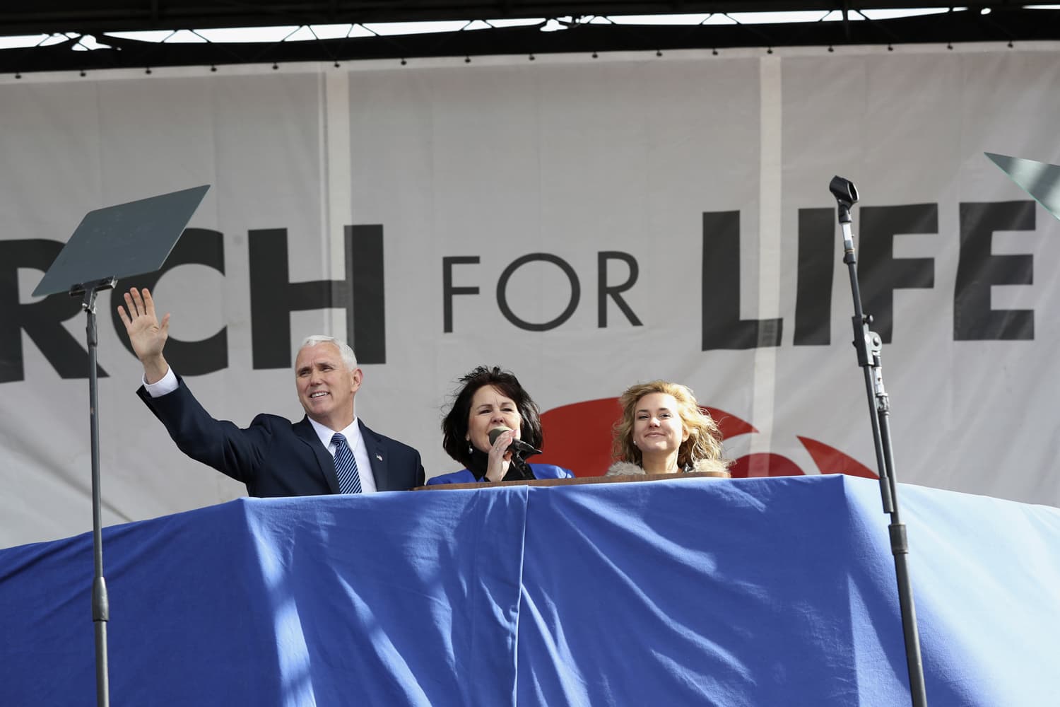 Vice President Mike Pence, with his wife Karen Pence, center, waves while speaking at the March for Life on the National Mall in Washington. (Manuel Balce Ceneta/AP)