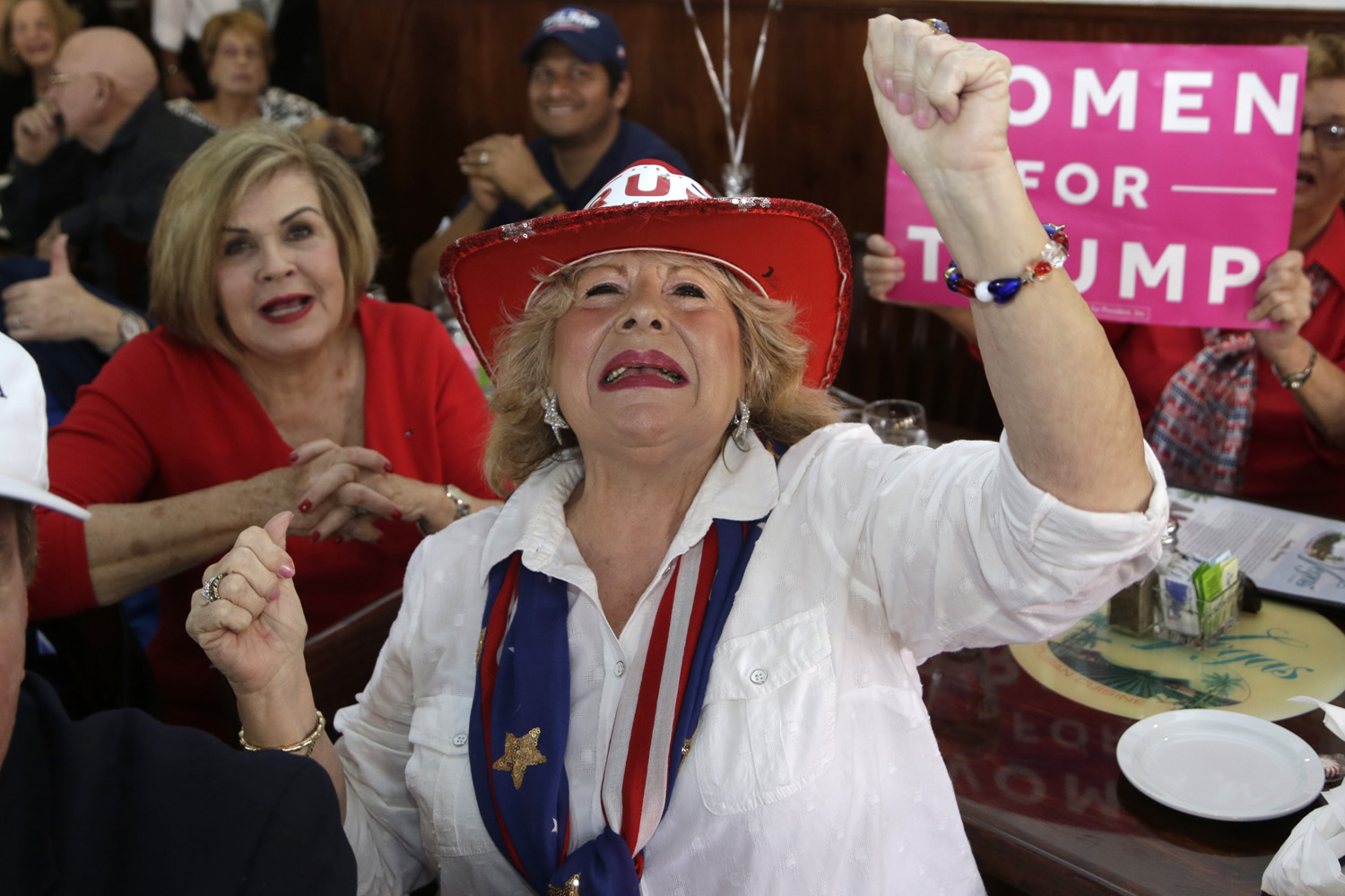 Martie Mees cheers as she watches a televised broadcast of the presidential inauguration of Donald Trump during a watch party organized by Hispanas for Trump, in Miami. (Lynne Sladky/AP)