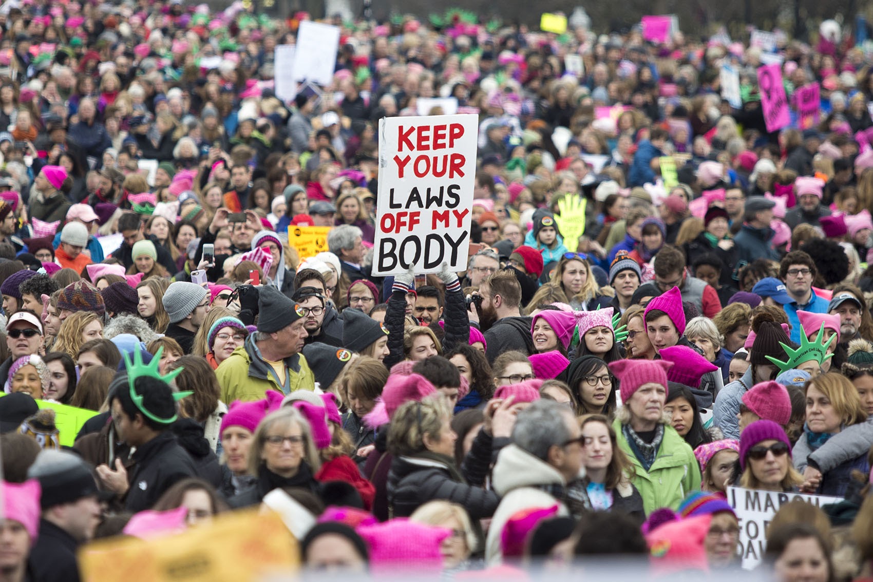 Pink &quot;Pussycats&quot; stand out at the Women's March in Boston on Jan. 21, 2017. (Jesse Costa/WBUR) (Jesse Costa/WBUR)