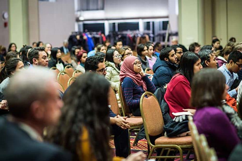 About 150 people attended a Boston University town hall meeting Tuesday to discuss the support being offered to international students in the wake of President Trump's executive orders on immigration. (Courtesy BU Today)
