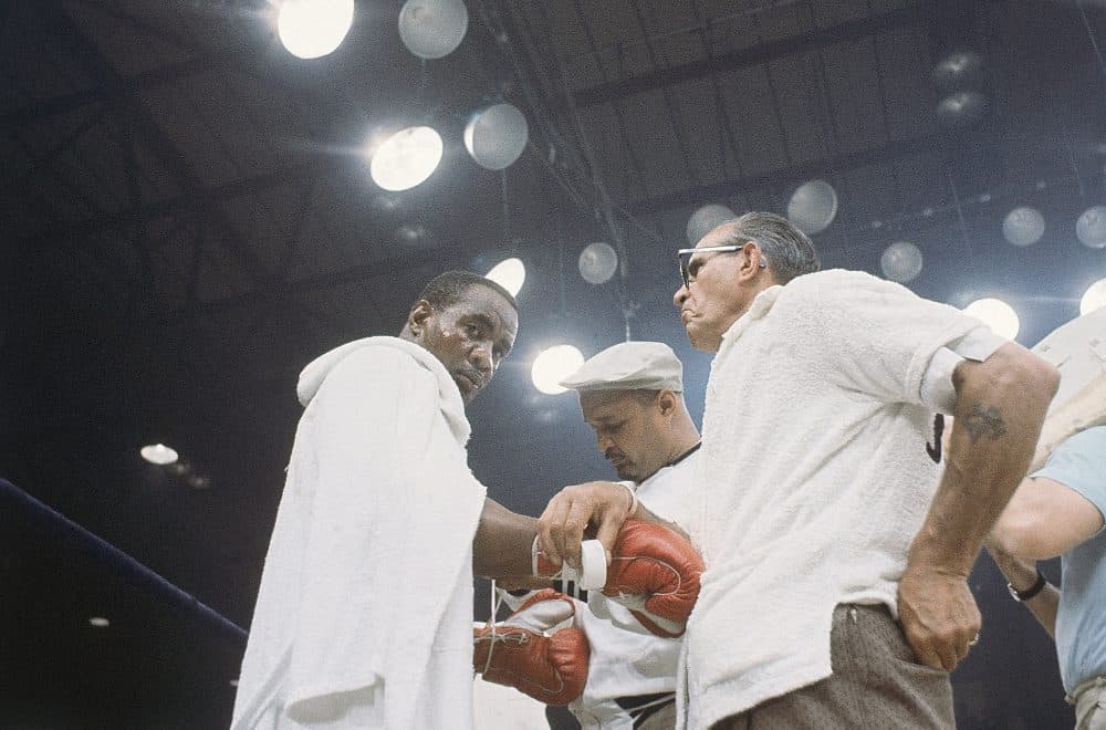 Sonny Liston, left, fought Muhammad Ali in 1964 and 1965. In 1970, he was dead. (AP)