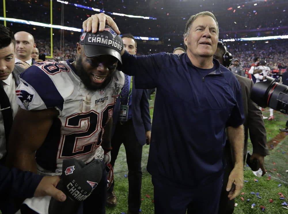 Belichick celebrates with James White the Patriots' Super Bowl win. (Eric Gay/AP)