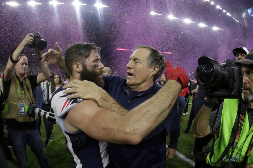 New England Patriots head coach Bill Belichick congratulates Julian Edelman after defeating the Atlanta Falcons in overtime at the NFL Super Bowl 51. (Matt Slocum/AP)