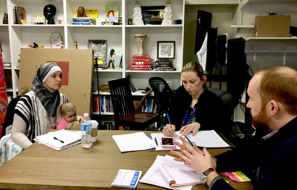 Nichole Mossalam of Malden (with her baby on her lap) and Sarah Khatib of Walpole are both exploring bids for elected office with the help of Jetpac, a nonprofit looking to engage Muslims in politics. (Shannon Dooling/WBUR)