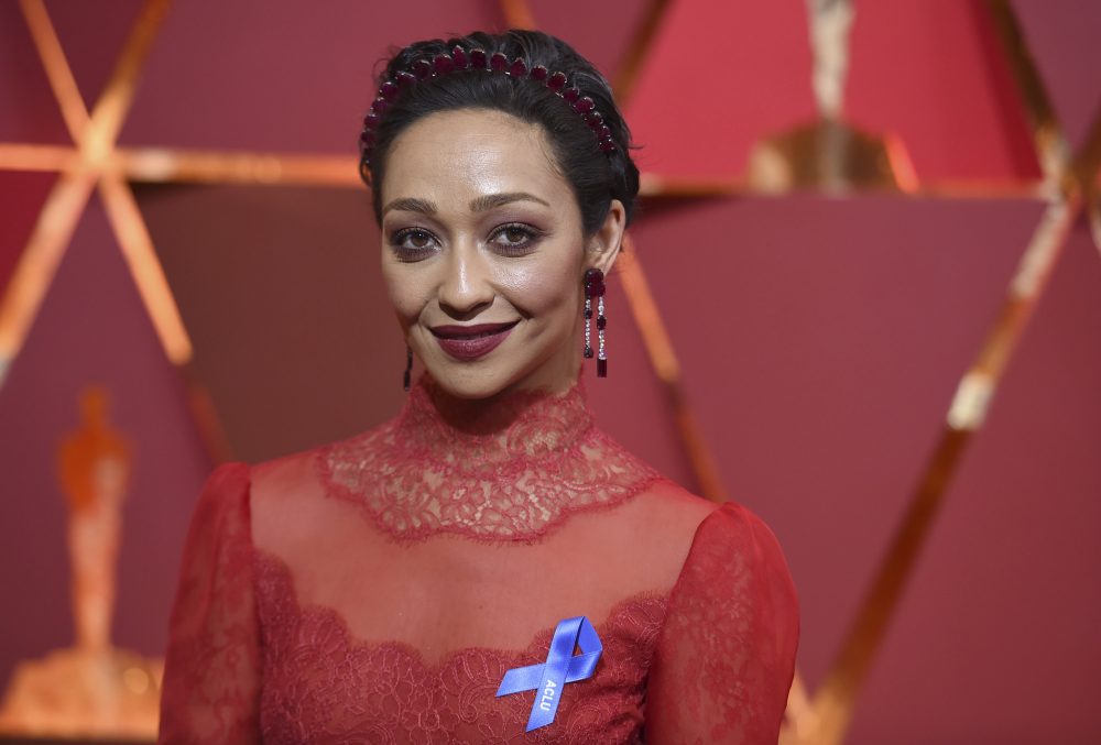 Ruth Negga, wearing the ACLU ribbon, arrives at the Oscars on Sunday. (Richard Shotwell/Invision/AP)