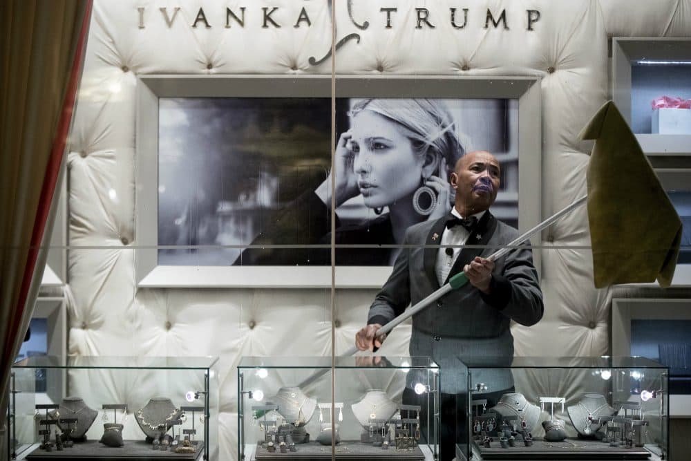 A worker cleans the windows of the Ivanka Trump Collection in the lobby of Trump Tower in New York, Tuesday, Jan. 17, 2017. (Andrew Harnik/AP)