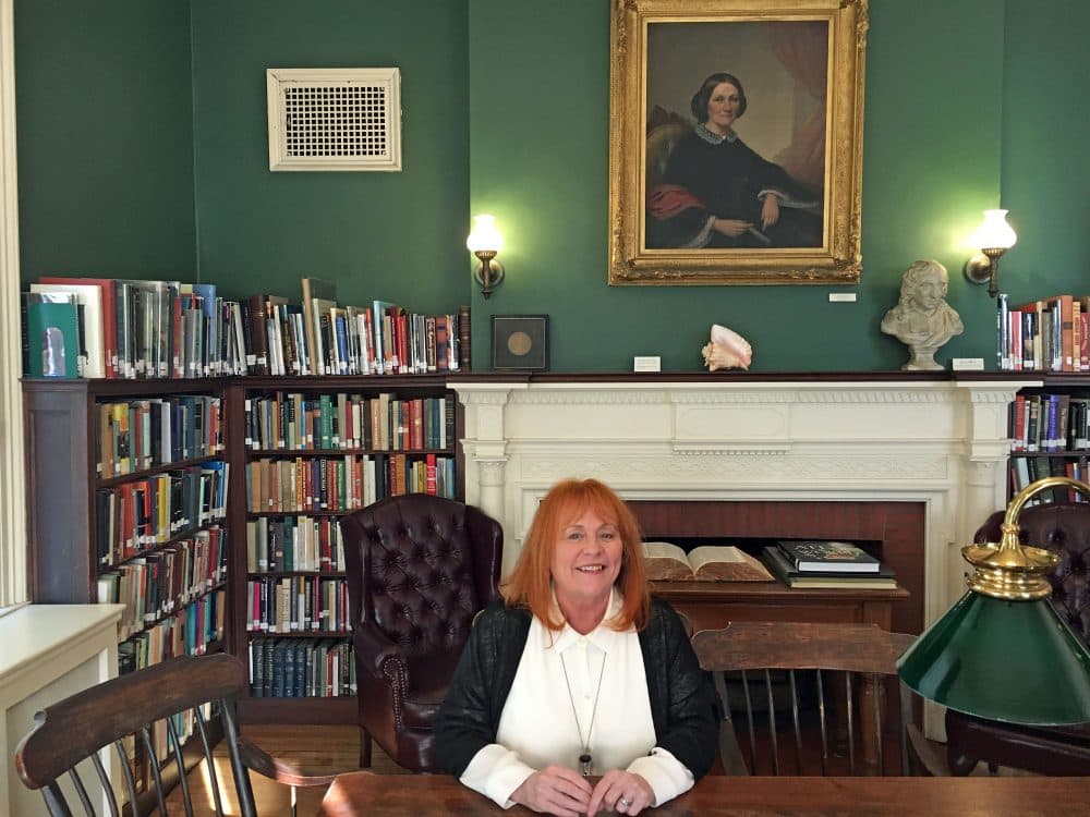 Brunonia Barry in the Salem Athenaeum at her writing spot. (Deborah Becker/ WBUR)