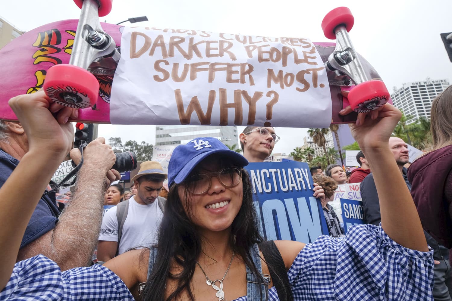 Thousands of people take part in the &#96;&#96;Free the People Immigration March,'' to protest actions taken by President Donald Trump and his administration, in Los Angeles. (Ringo H.W. Chiu/AP)