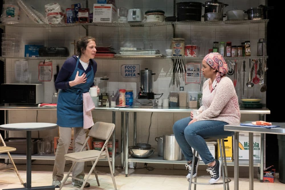 Shelley, played by Melinda Lopez, talks with Emma, played by Ally Dawson, in &quot;Grand Concourse.&quot; (Courtesy Glenn Perry Photography/SpeakEasy Stage)