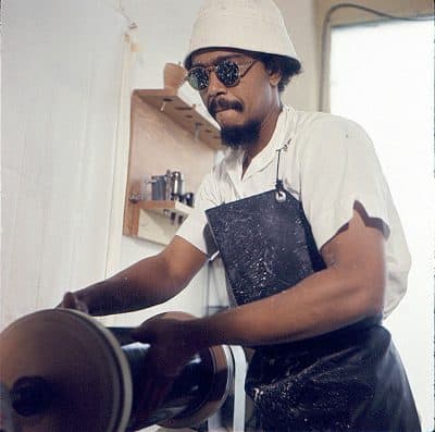 Fred Eversley polishes a sculpture in 1970. (Courtesy of the artist)