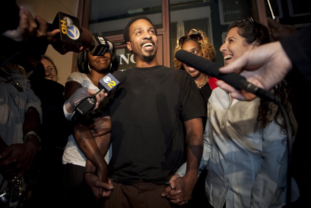 Obie Anthony, center, whose murder conviction was overturned after 17 years behind bars, talks to reporters as he is joined by family members and supporters after he was released from the prison in Los Angeles, Tuesday, Oct. 4, 2011. (Damian Dovarganes/AP)
