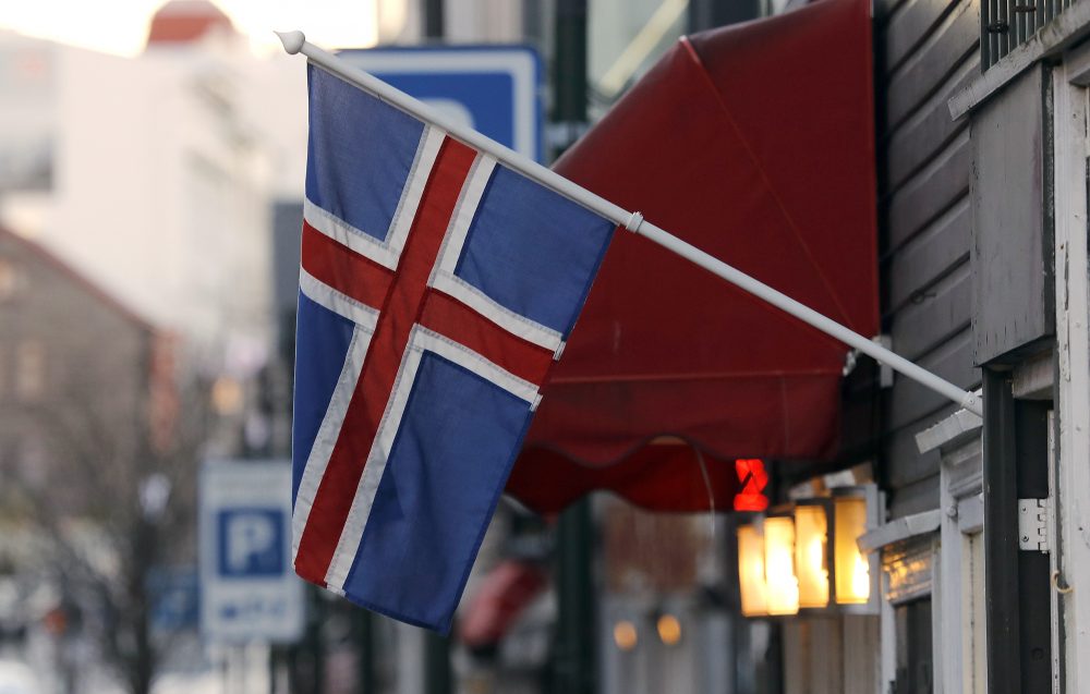 In this Thursday, Oct. 27, 2016 file photo, an Icelandic flag hangs outside a shop in Reykjavik. (Frank Augstein/AP)