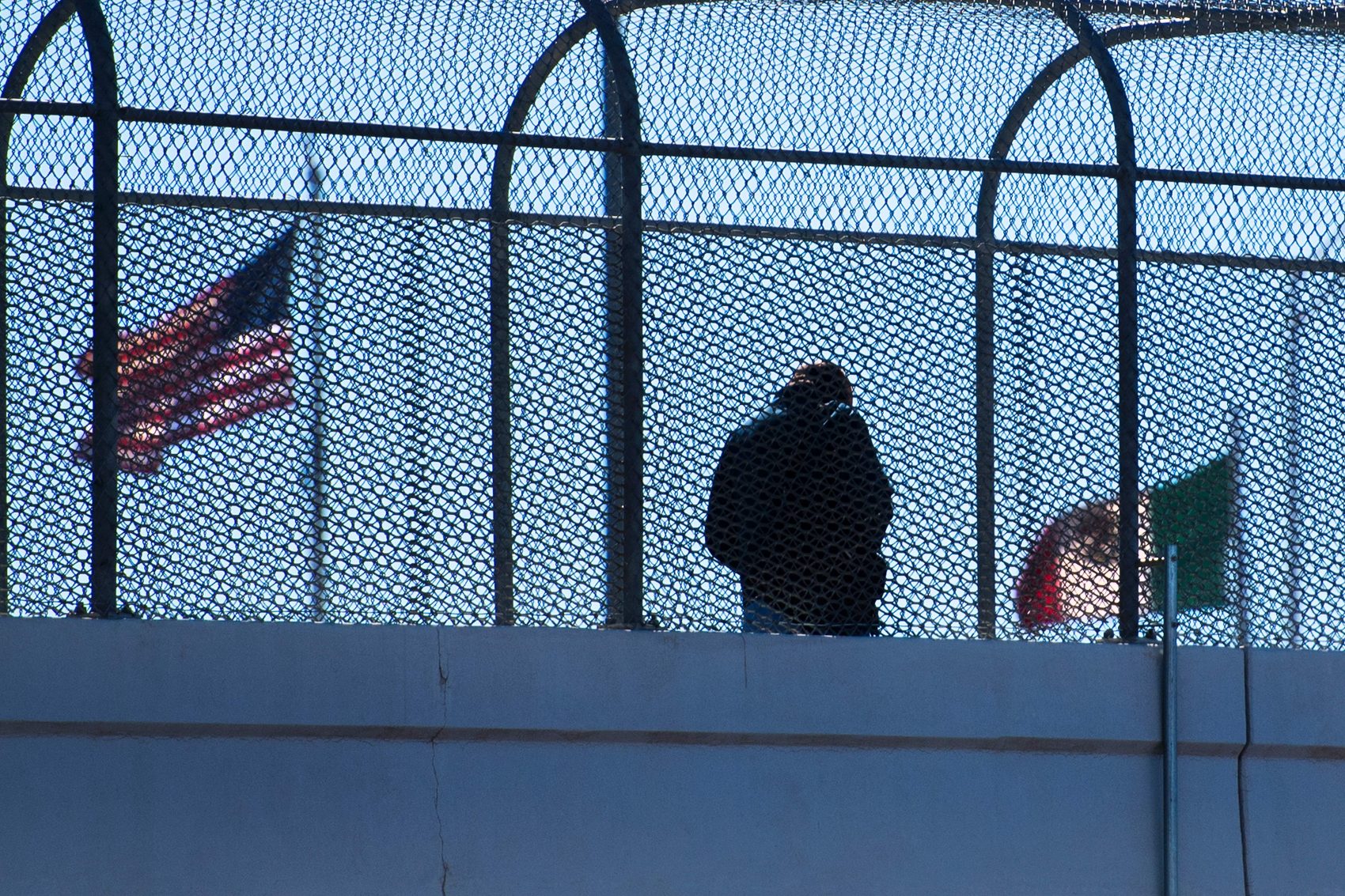 A man crosses the footbridge to Juarez, Mexico, from El Paso, Texas, on Feb. 20, 2017. (Jim Watson/AFP/Getty Images)