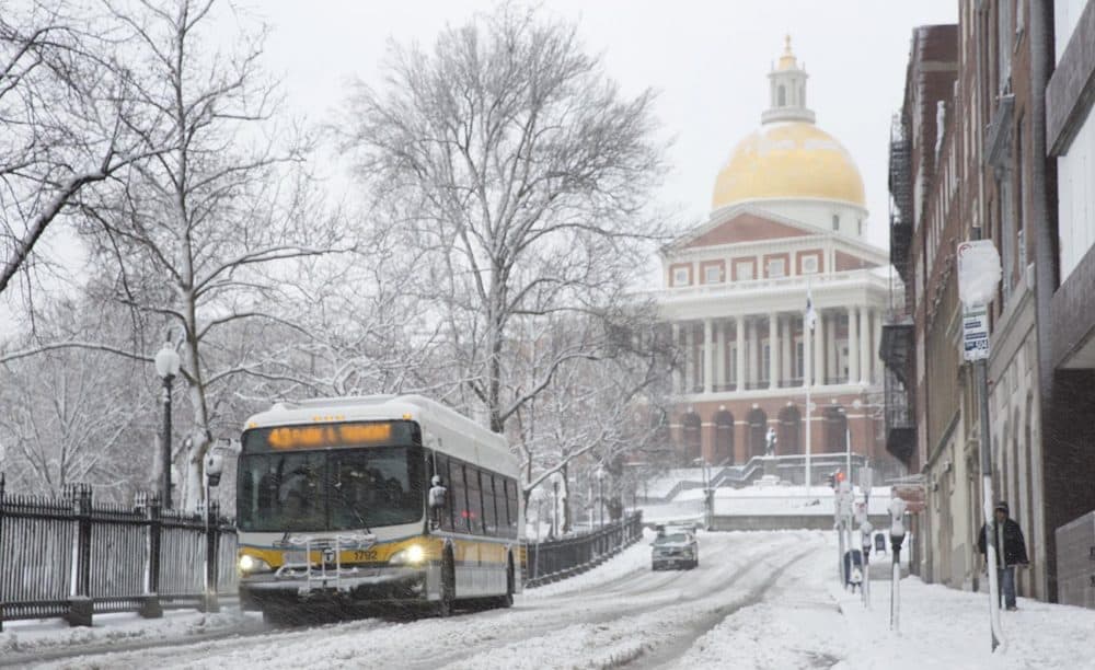 The State House is seen during Tuesday's storm. (Robin Lubbock/WBUR)