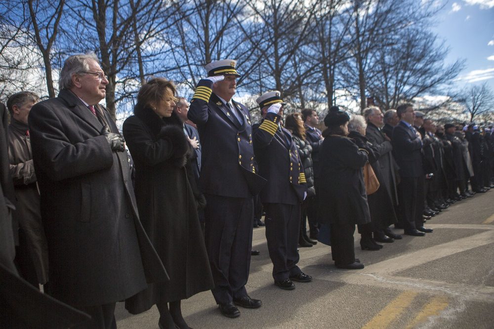 House Speaker Robert DeLeo, Attorney General Maura Healey, and Boston Fire Chief Joseph Finn were among those in attendance at Toscano's funeral Wednesday. (Jesse Costa/WBUR)
