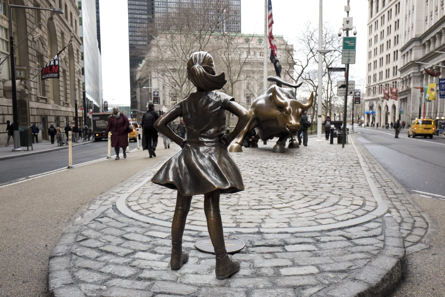 The "Fearless Girl" statue faces Wall Street's charging bull statue in New York City. (Mark Lennihan/AP/file)