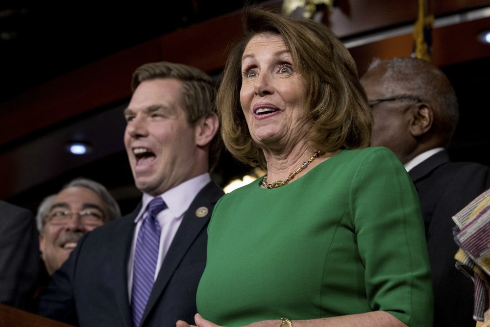 House Minority Leader Nancy Pelosi of Calif., right, accompanied by Rep. G. K. Butterfield, D-N.C., left, and Rep. Eric Swalwell, D-Calif., second from left, joke while speaking at a news conference on Capitol Hill Friday. Republican leaders abruptly pulled their troubled health care overhaul bill off the House floor, short of votes and eager to avoid a humiliating defeat for President Trump and GOP leaders. (Andrew Harnik/AP)
