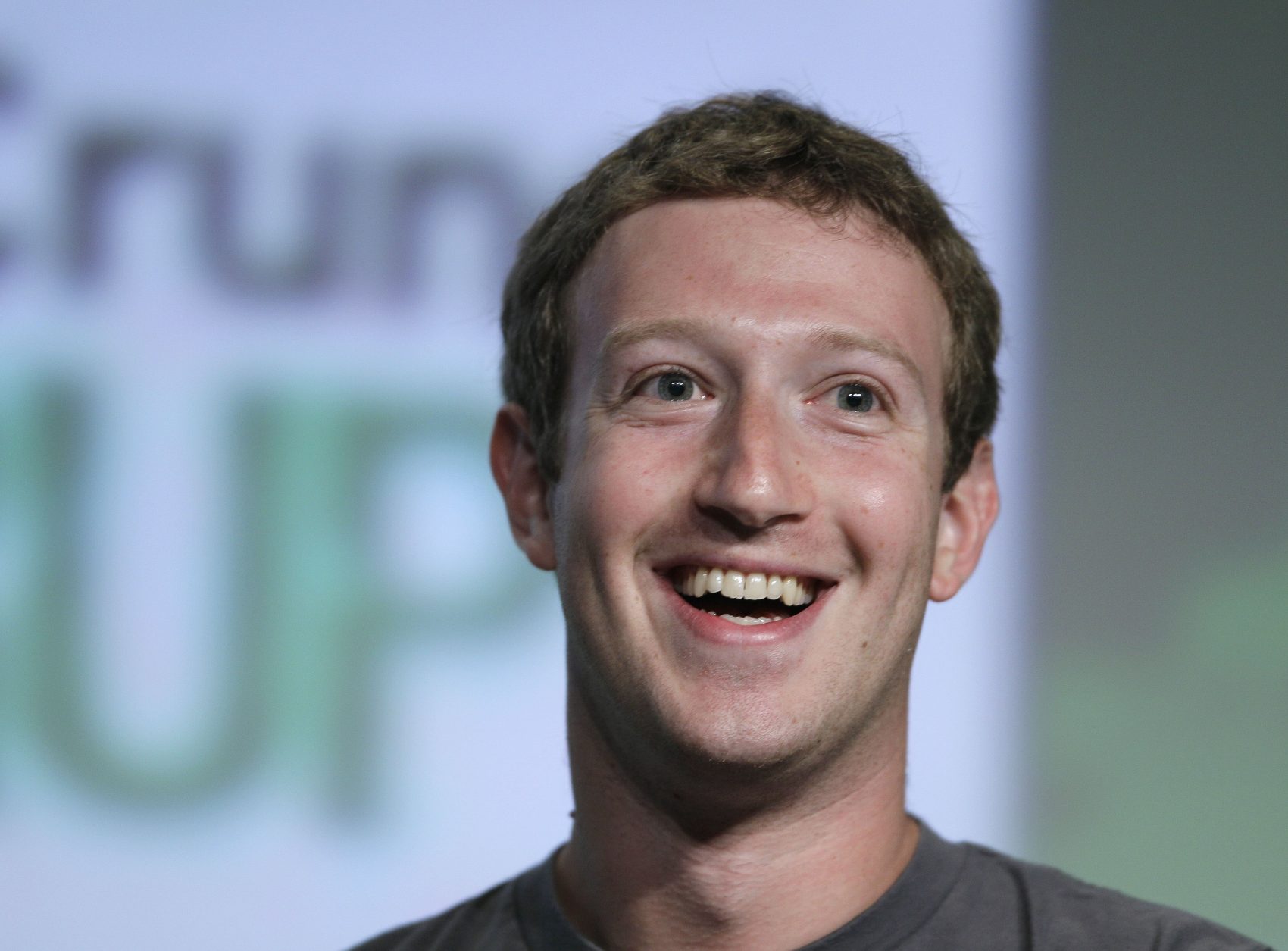 Facebook CEO Mark Zuckerberg speaks during a "fireside chat" at a conference organized by technology blog TechCrunch in San Francisco, Tuesday, Sept. 11, 2012. Zuckerberg gave his first interview since the company's rocky initial public offering in May. (AP Photo/Eric Risberg)