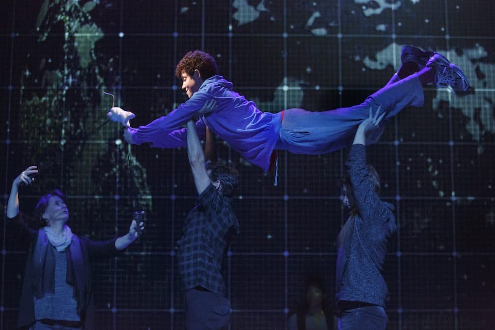 The cast hoists Adam Langdon's Christopher Boone in &quot;The Curious Incident of the Dog in the Night-Time&quot; (Courtesy Boston Opera House)