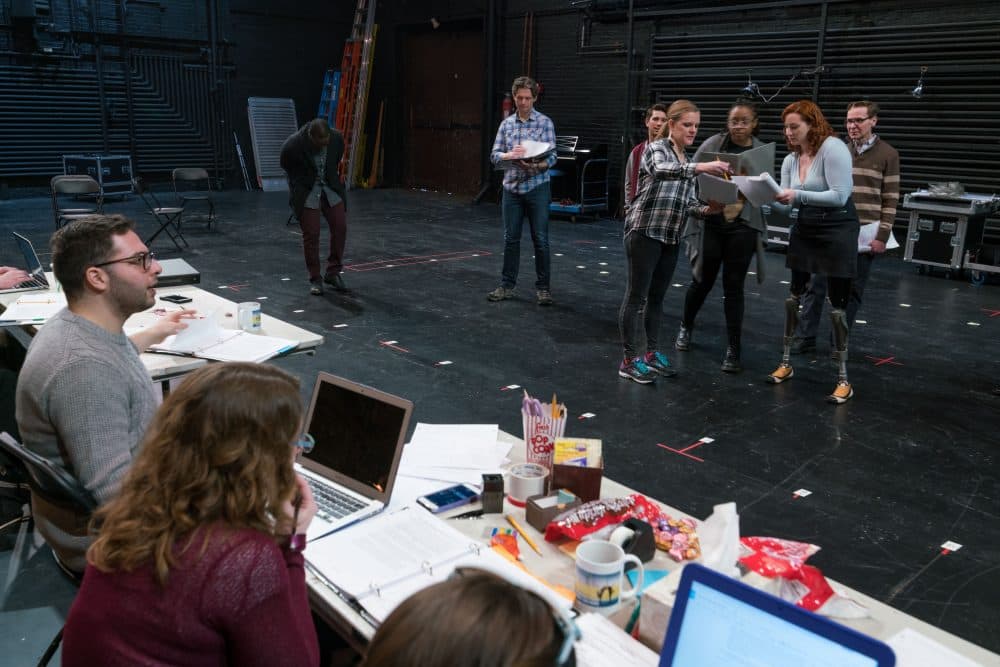 Director Joey Frangieh (seated, left) looks on during a rehearsal for &quot;Finish Line&quot; at Shubert Theatre. (Courtesy Nile Scott/Boch Center)