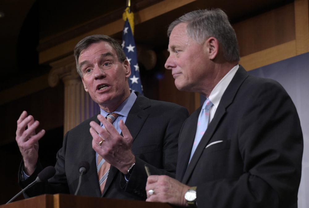 Senate Intelligence Committee Chairman Sen. Richard Burr, R-N.C., right, and the committee's Vice Chairman Sen. Mark Warner, D-Va., during a news conference in Washington Wednesday (Susan Walsh/AP)