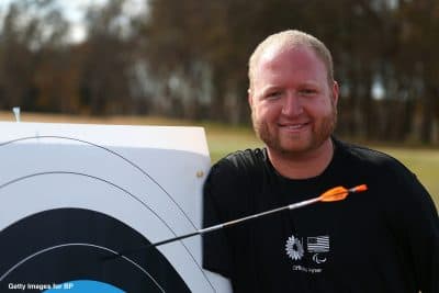 Matt with his record-setting arrow. (Sarah Crabill/Getty Images for BP America)