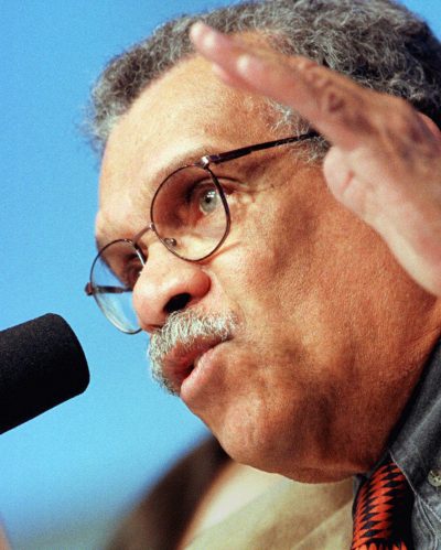 Nobel Laureate Derek Walcott speaks to writers at the John F. Kennedy Library in Boston in 1999 during a two-day literary symposium celebrating the 100th anniversary of Hemingway's birth. (Steven Senne/AP)