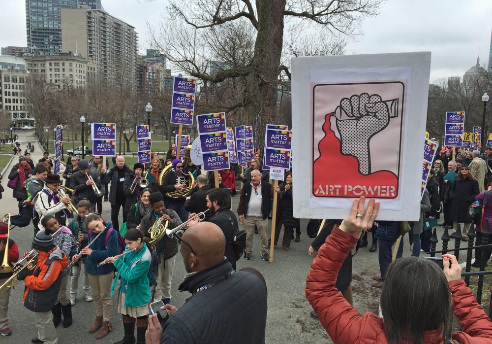 Hundreds of Massachusetts artists and advocates marched to the State House Tuesday to make the case for an increase in arts funding. (Andrea Shea/WBUR)