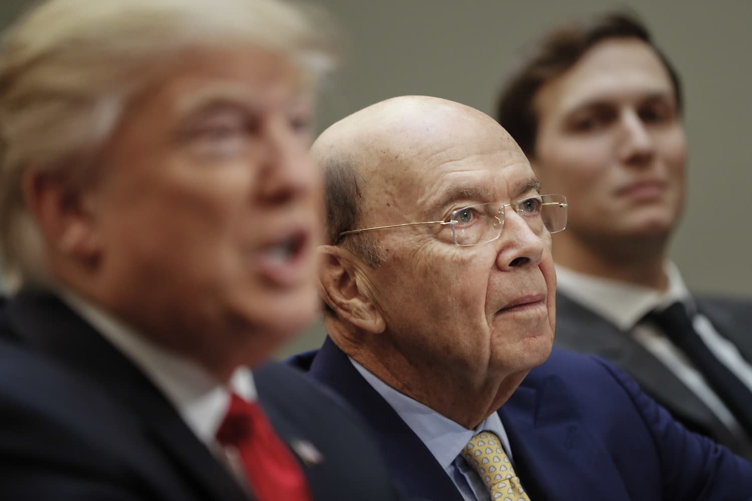 Commerce Secretary-designate Wilbur Ross, center, listens to President Donald Trump during a meeting with House and Senate legislators in the Roosevelt Room of the White House in Washington. (Pablo Martinez Monsivais/AP)