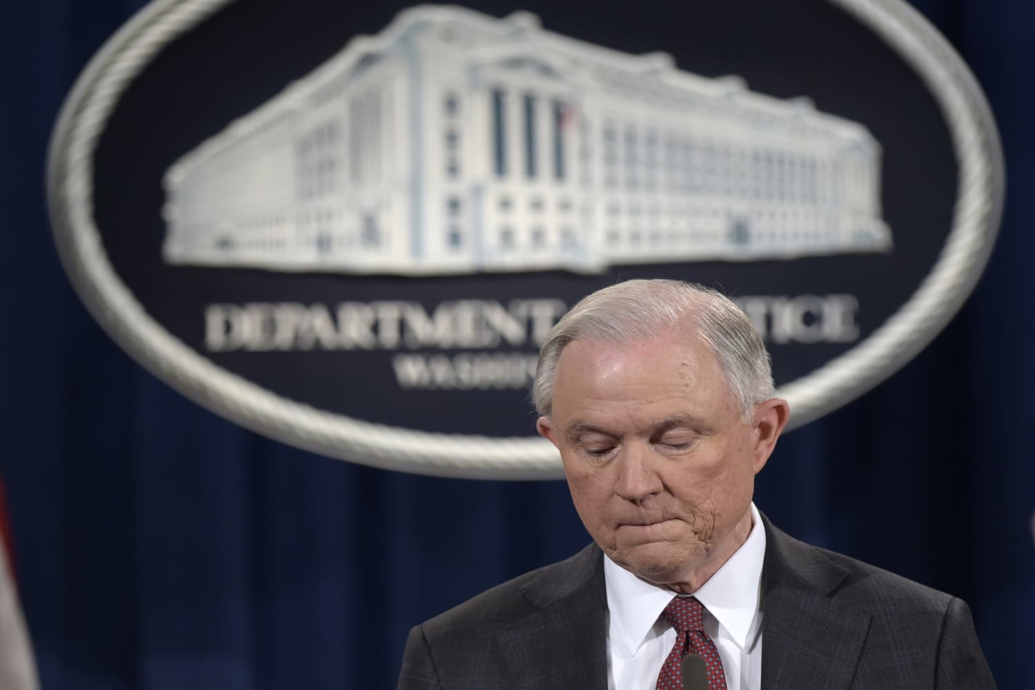 Attorney General Jeff Sessions pauses during a news conference at the Justice Department in Washington. (Susan Walsh/AP)