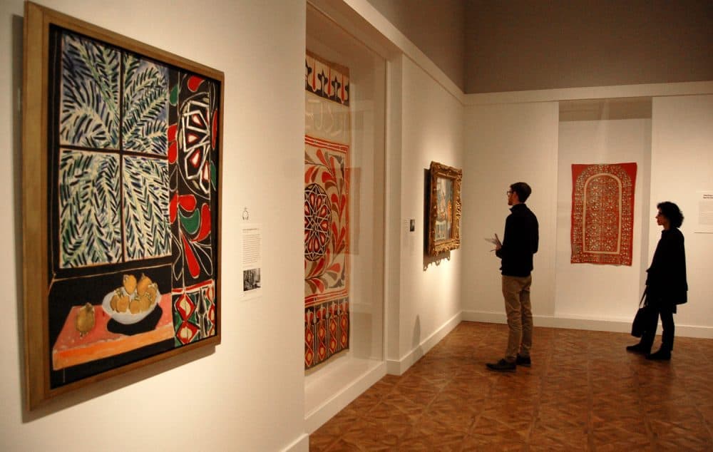 Matisse's 1948 painting &quot;Interior with Egyptian Curtain&quot; (left) is deftly paired with the cotton textile (center) depicted in the right side of the artwork. (Greg Cook)