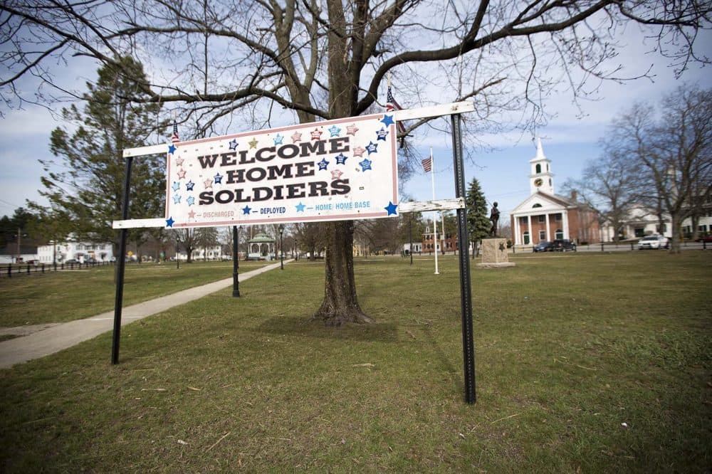 A banner welcoming local soldiers home from military service is displayed on the Townsend green. In Townsend, voters chose Trump over Hillary Clinton 50 to 41 percent. It's one of about 50 towns in the central part of the state that went for Trump. And they are the focus of the WBUR poll. (Jesse Costa/WBUR)