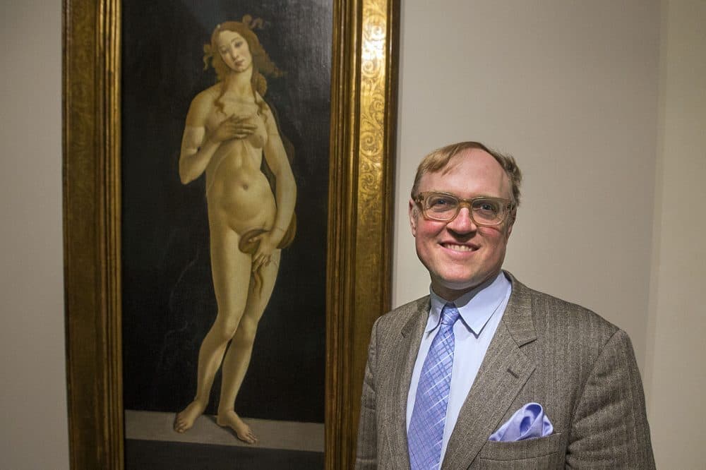 Frederick Ilchman stands in front of Sandro Botticelli's &quot;Venus.&quot; (Jesse Costa/WBUR)