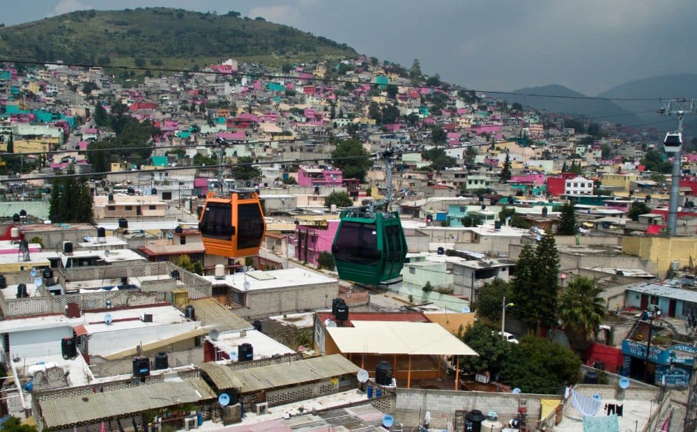 A view of cable cars over a neighborhood in Ecatepec, Mexico, on Aug. 25, 2016. (Mario Vazquez/AFP/Getty Images)