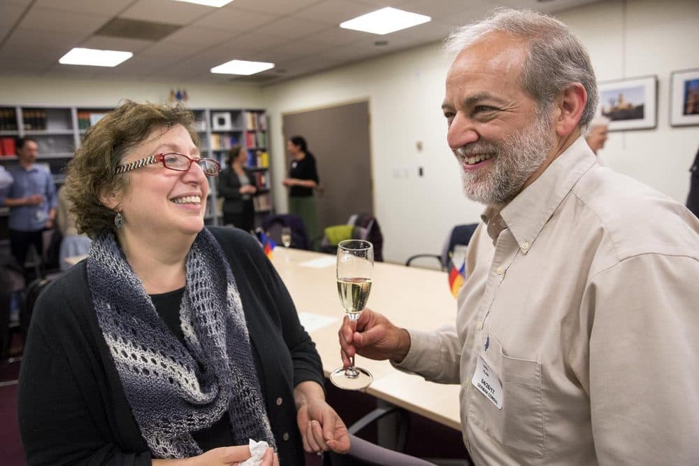 Larry Klein, 59, from Newton, Mass. celebrates his German citizenship with his wife Amy Gilman, 56. (Robin Lubbock/WBUR)