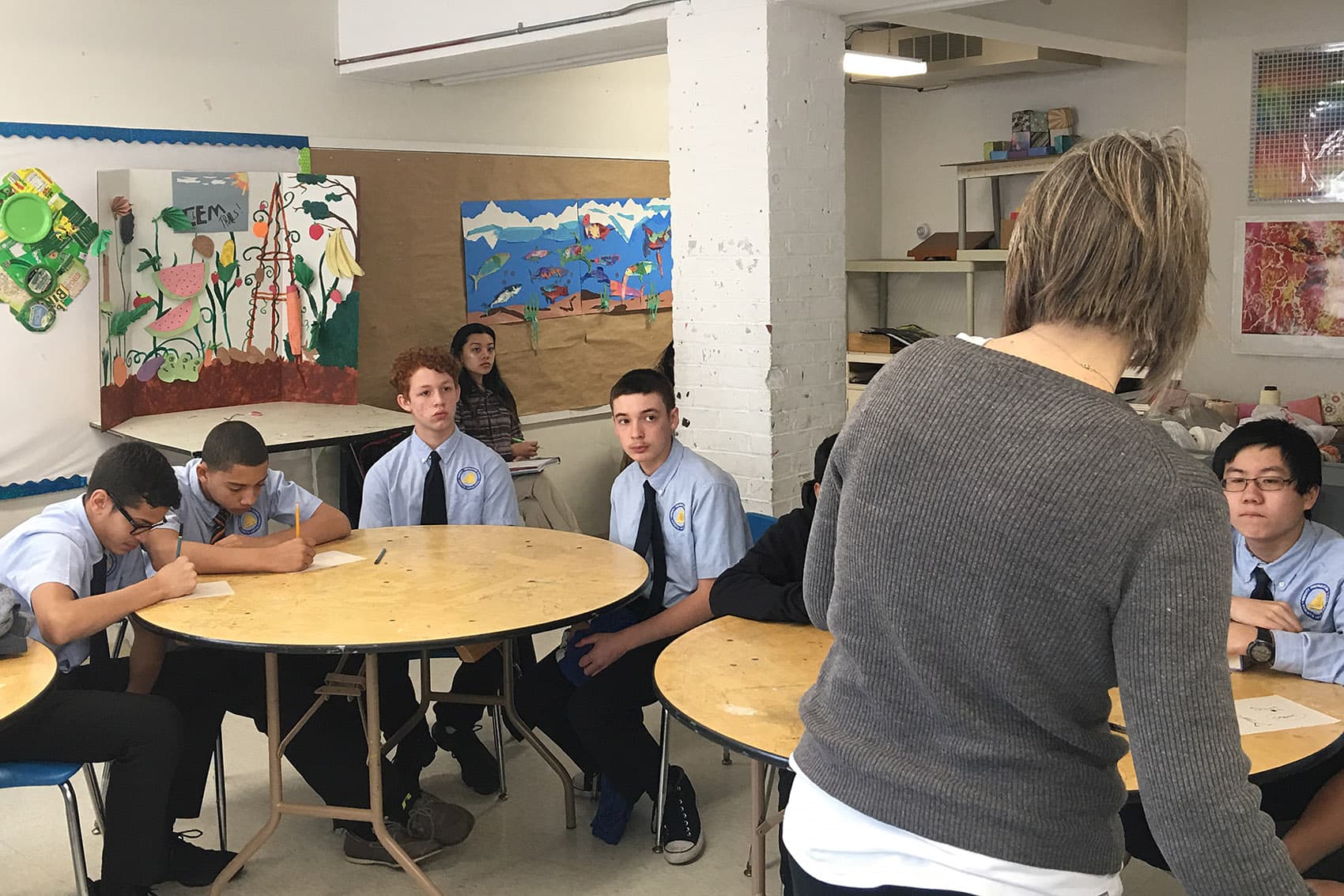 Eighth-graders in art class at Nativity Preparatory School of New Bedford, where all of the teachers are volunteers. (Tonya Mosley/WBUR)