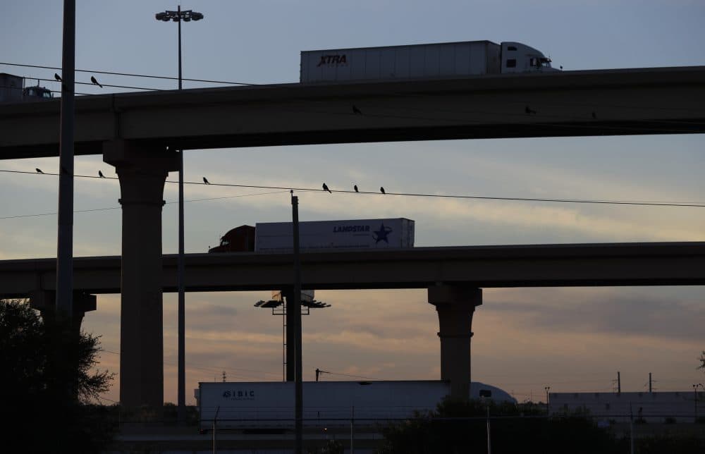 Trucks travel on an overpass to and from the World Trade Bridge, in Laredo, Texas in Nov. 2016. Trump’s campaign promise to abandon the North American Free Trade Agreement helped win over Rust Belt voters, but the idea is unnerving to many people in cities on the U.S.-Mexico border. (Eric Gay/AP)
