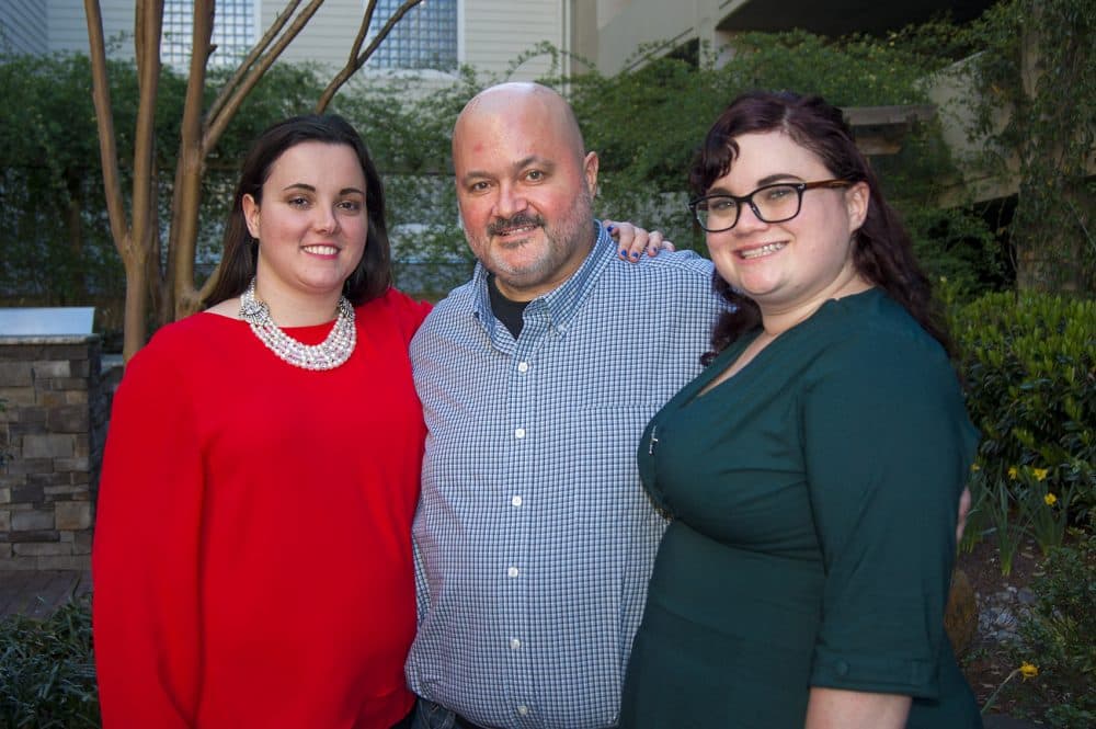 Sean Bunn, and his daughters Kelly Best, left, and Niki Ilse. In the midst of fighting brain cancer, Sean found out he has two biological daughters as a result of donating sperm when he was a college student. (Lynn Jolicoeur/WBUR)