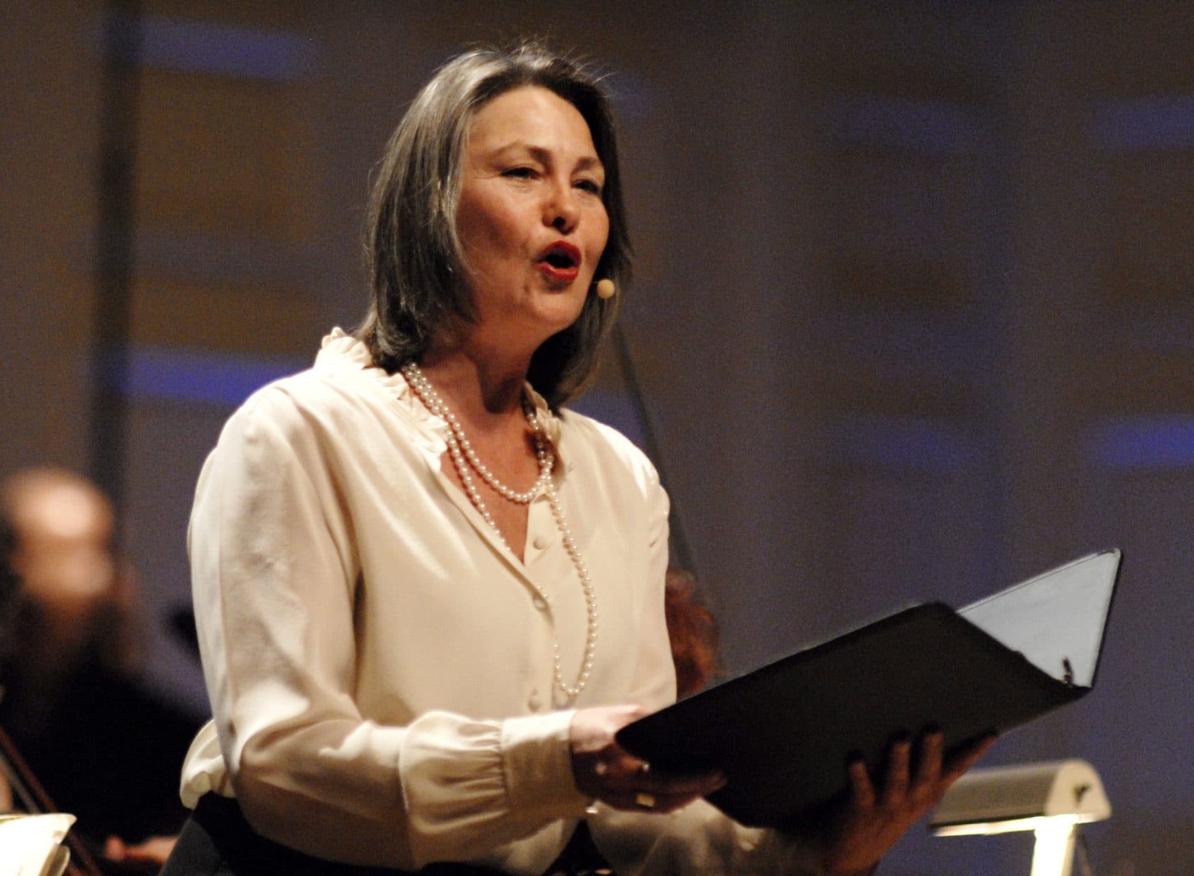 Cherry Jones reads in front of the Boston Pops at Symphony Hall in 2010 for "The Dream Lives On: A Portrait of the Kennedy Brothers." (Josh Reynolds/AP Images for Boston Symphony)
