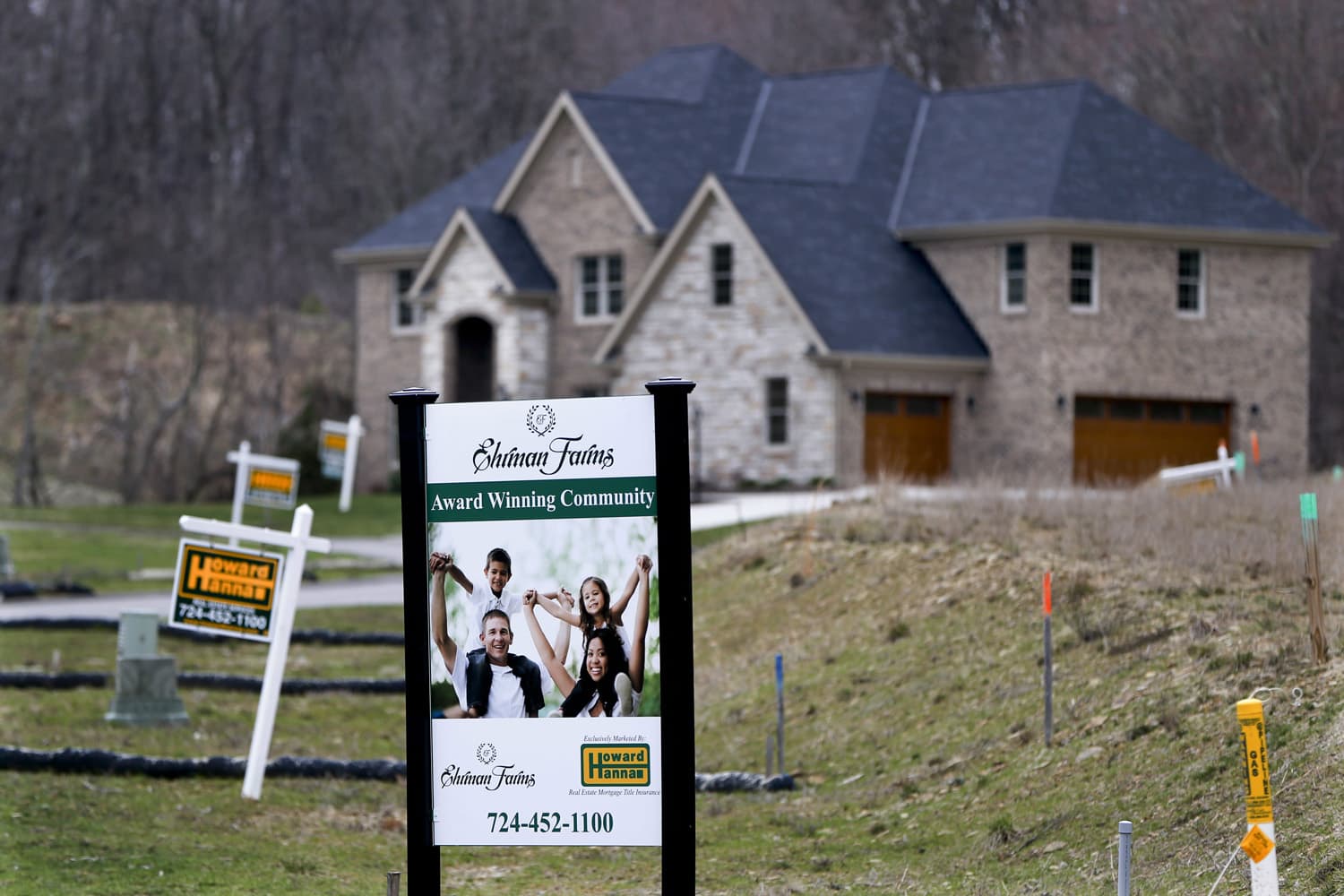 In this Monday, Feb. 27, 2017, photo, real estate signs mark the lots near one of the new homes for sale in a development for new homes in Cranberry Township, Butler County, Pa. (Keith Srakocic/AP)