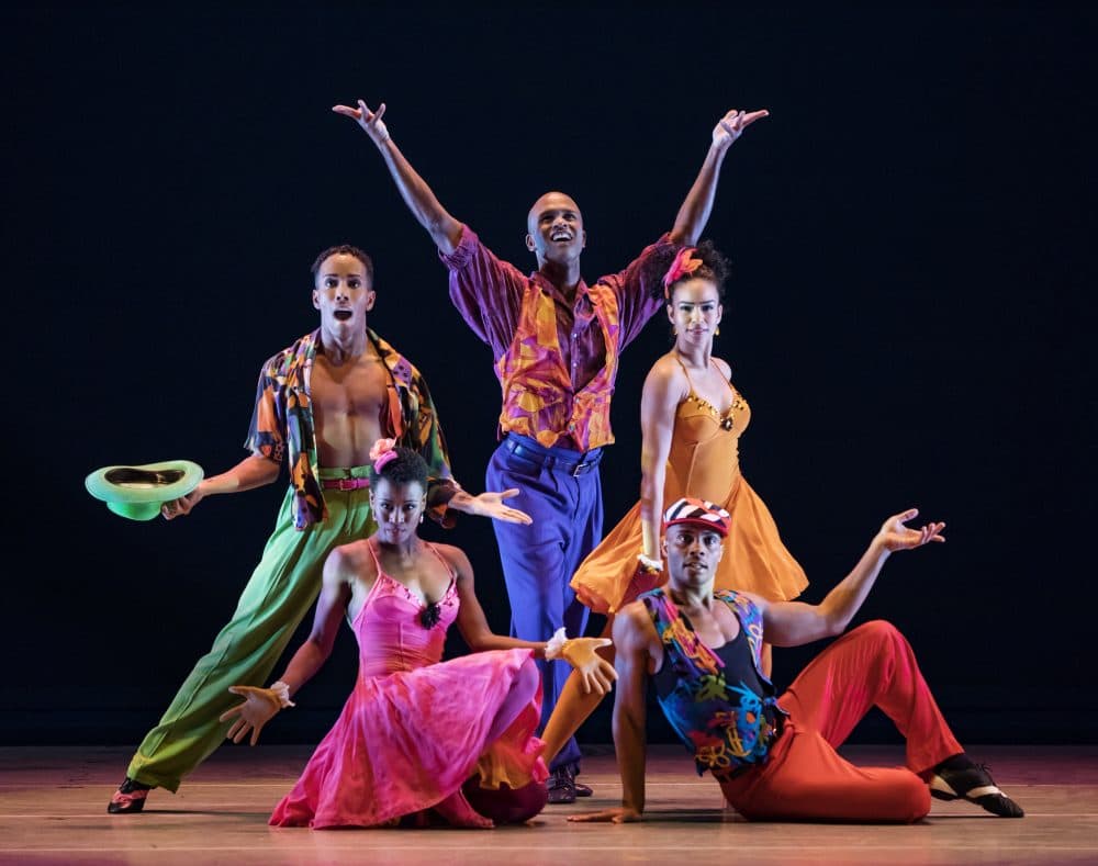 Alvin Ailey dancers, including Belen Pereyra in the orange dress on the right, perform &quot;The Winter in Lisbon.&quot; They'll be performing the same program in Boston on their spring tour. (Courtesy Paul Kolnik)
