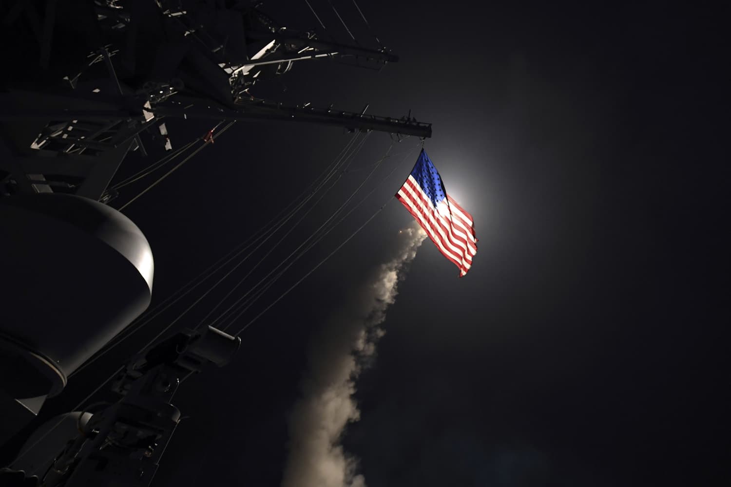 In this image provided by the U.S. Navy, the guided-missile destroyer USS Porter (DDG 78) launches a tomahawk land attack missile in the Mediterranean Sea, Friday, April 7, 2017. (U.S. Navy/AP)