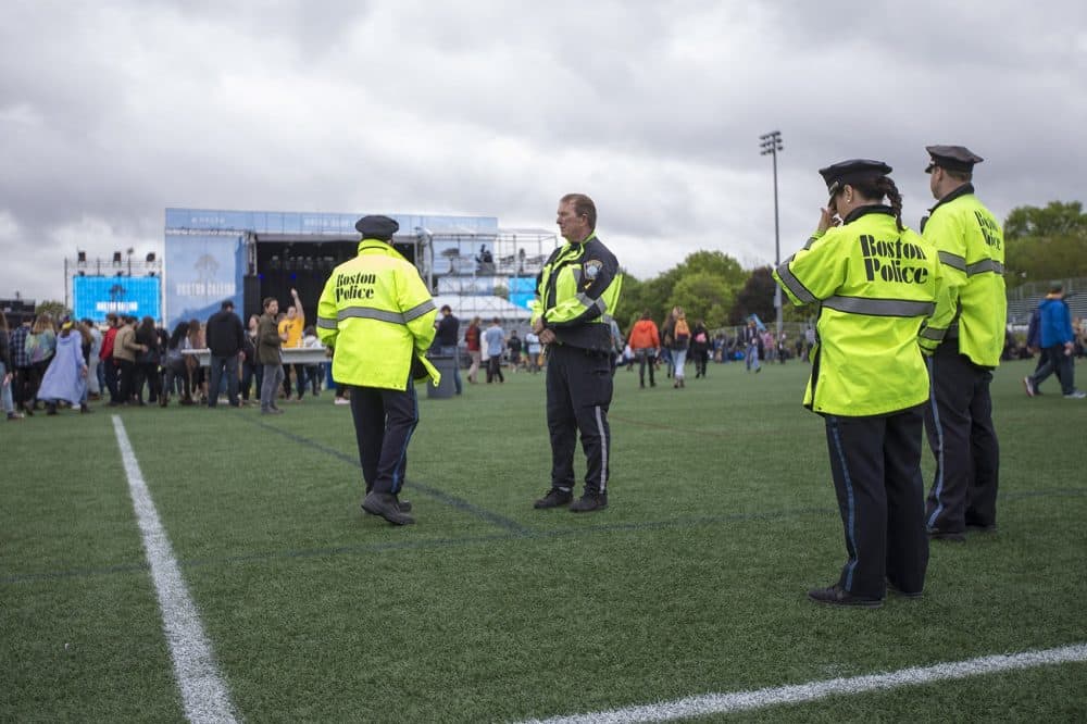 Boston Police patrol the perimeter of the festival. (Jesse Costa/WBUR)