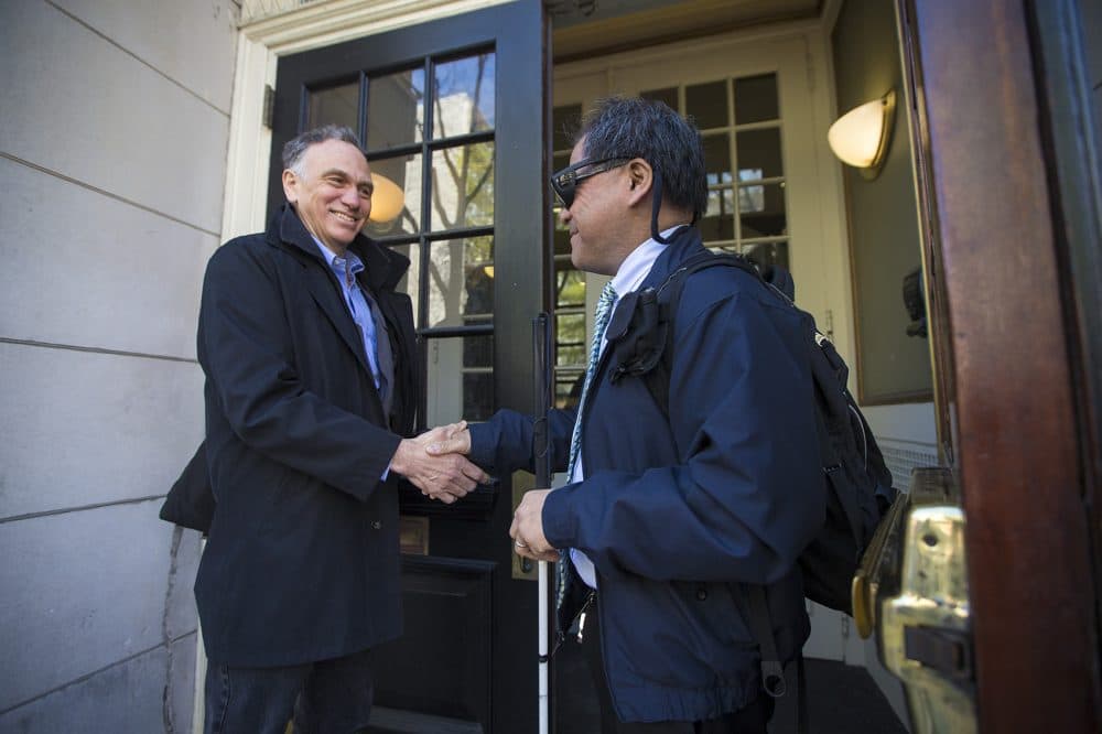 Blair bids farewell to David after they arrive at the Benjamin Franklin Institute of Technology. (Jesse Costa/WBUR)