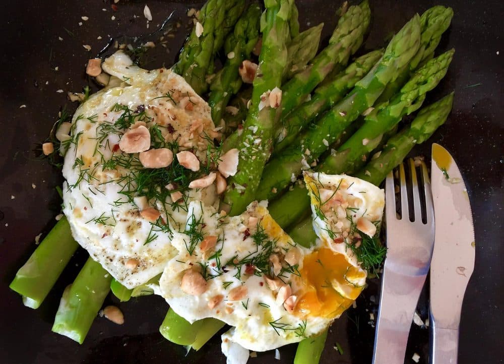 Kathy 's steamed asparagus with fried eggs, brown butter and a dill-lemon sauce. (Kathy Gunst for Here &amp; Now)