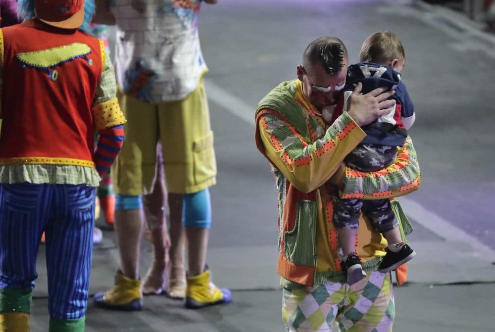 Ringling Bros. boss clown Sandor Eke hugs his 2-year-old son, Michael, after the red unit's final show on Sunday, May 7, in Providence, R.I. &quot;The Greatest Show on Earth&quot; is about to put on its last show on earth. (Julie Jacobson/AP)