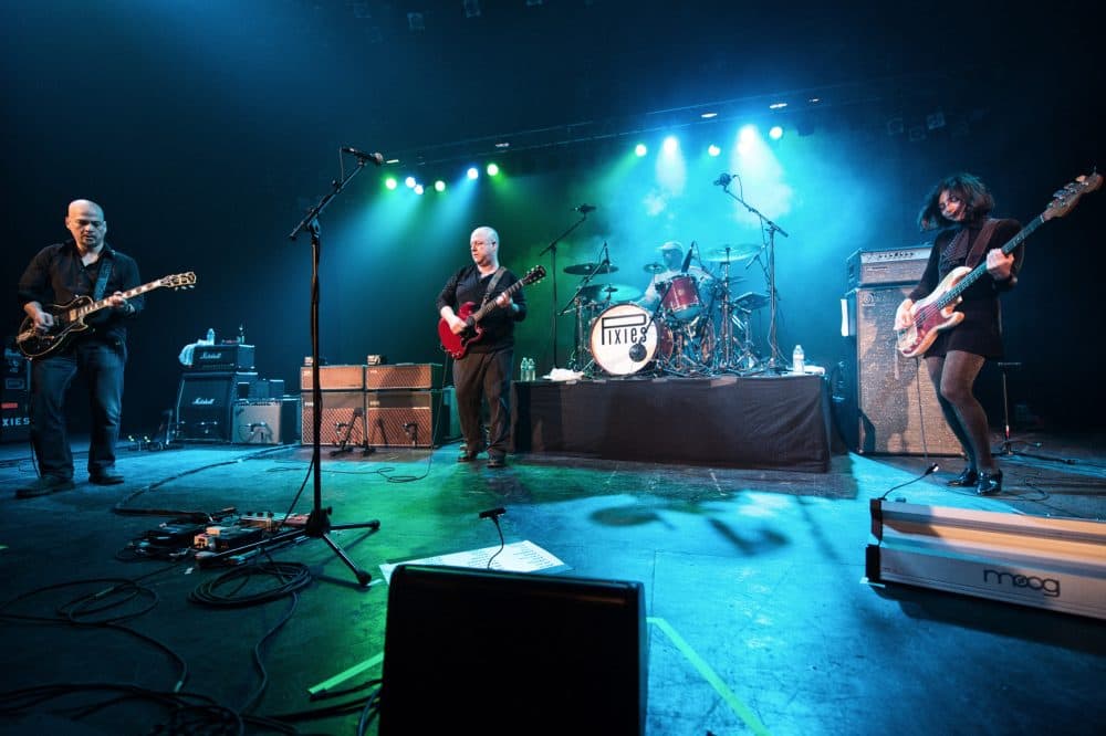 Pixies in concert at the Orpheum Theatre in Boston in 2014. From left to right: Joey Santiago, Black Francis, David Lovering and Paz Lenchantin. (Courtesy Dana Yarvin)