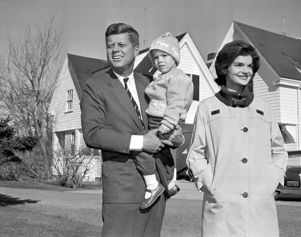 Then-Sen. John F. Kennedy with his wife, Jacqueline, as he holds their daughter, Caroline, outside their home in Hyannis Port, Mass. on Nov. 8, 1960. (AP)