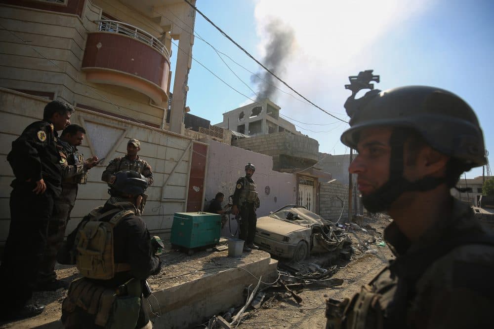Smoke billows as Iraqi Counter-Terrorism Services (CTS) advance in West Mosul's Al-Najjar neighborhood on May 22, 2017, during the ongoing offensive to retake the area from Islamic State group fighters. (Ahmad al-Rubaye/AFP/Getty Images)